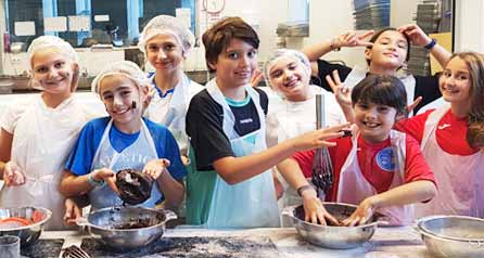 Group of children cooking