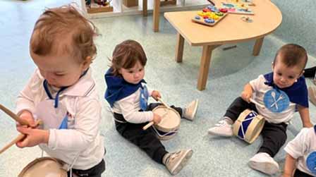 Children from the Aldapeta nursery playing with the drum